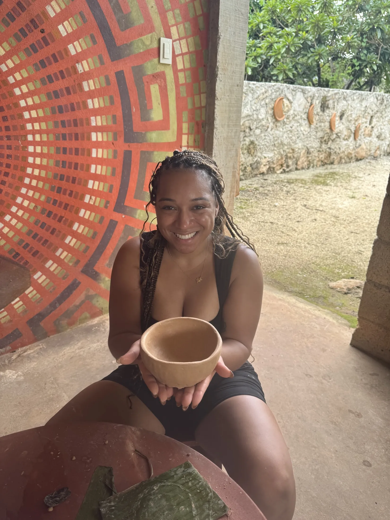 Holding a handmade bowl during a personal moment